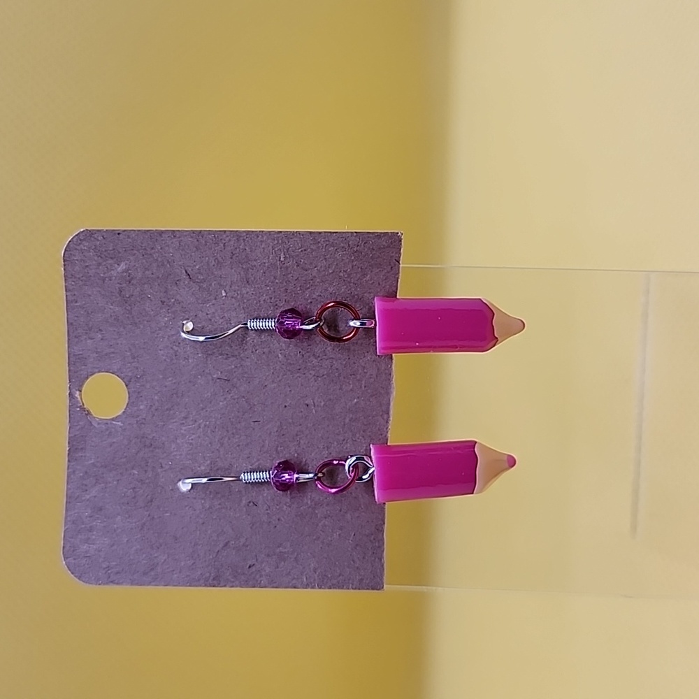 Pink colored pencil earrings